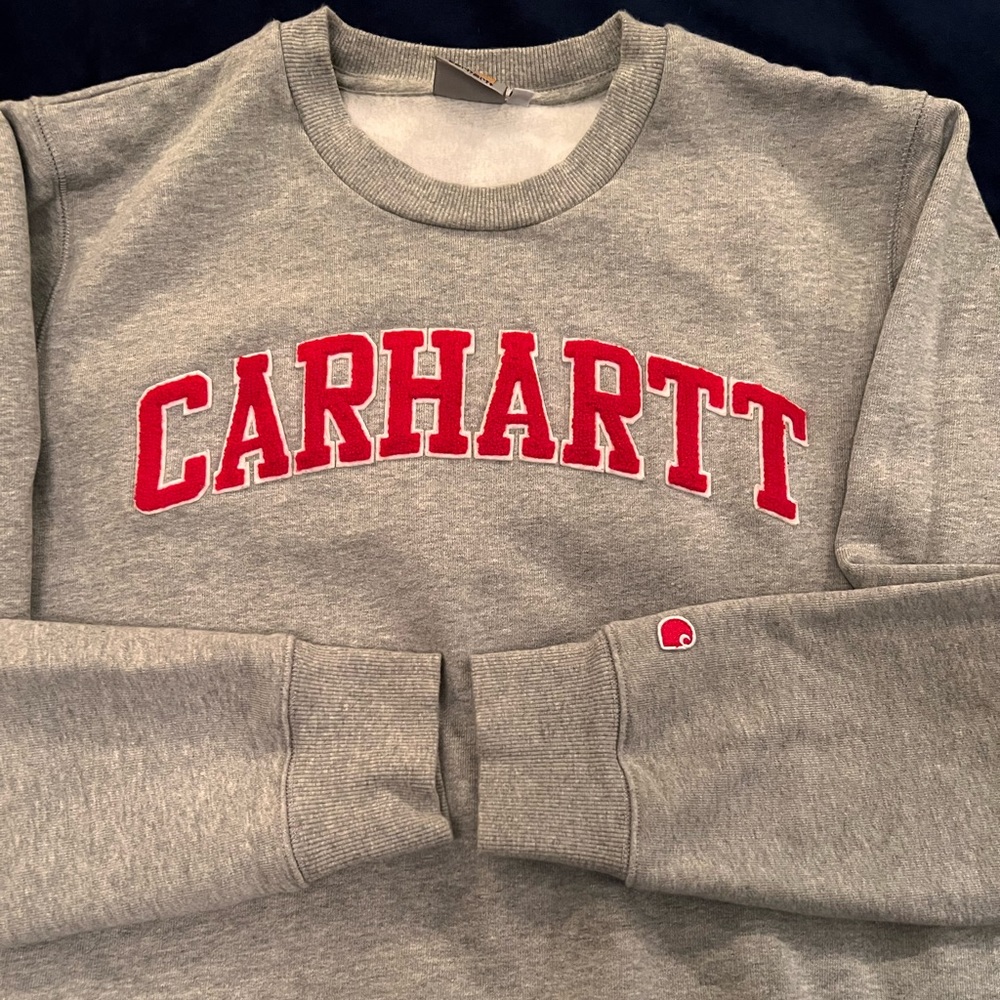 Carhaartt sweatshirt.